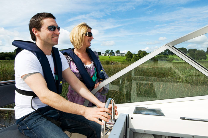 Couple navigates on Lough Ree